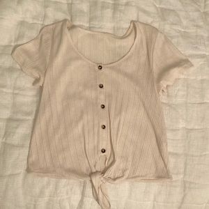 White cream button down top with Tie at bottom, from a local boutique, so no tag